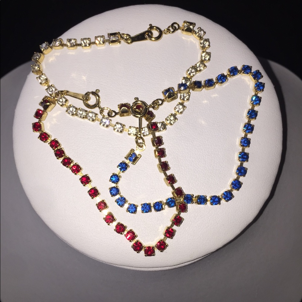 Set Of Three Red Clear Blue Bracelets